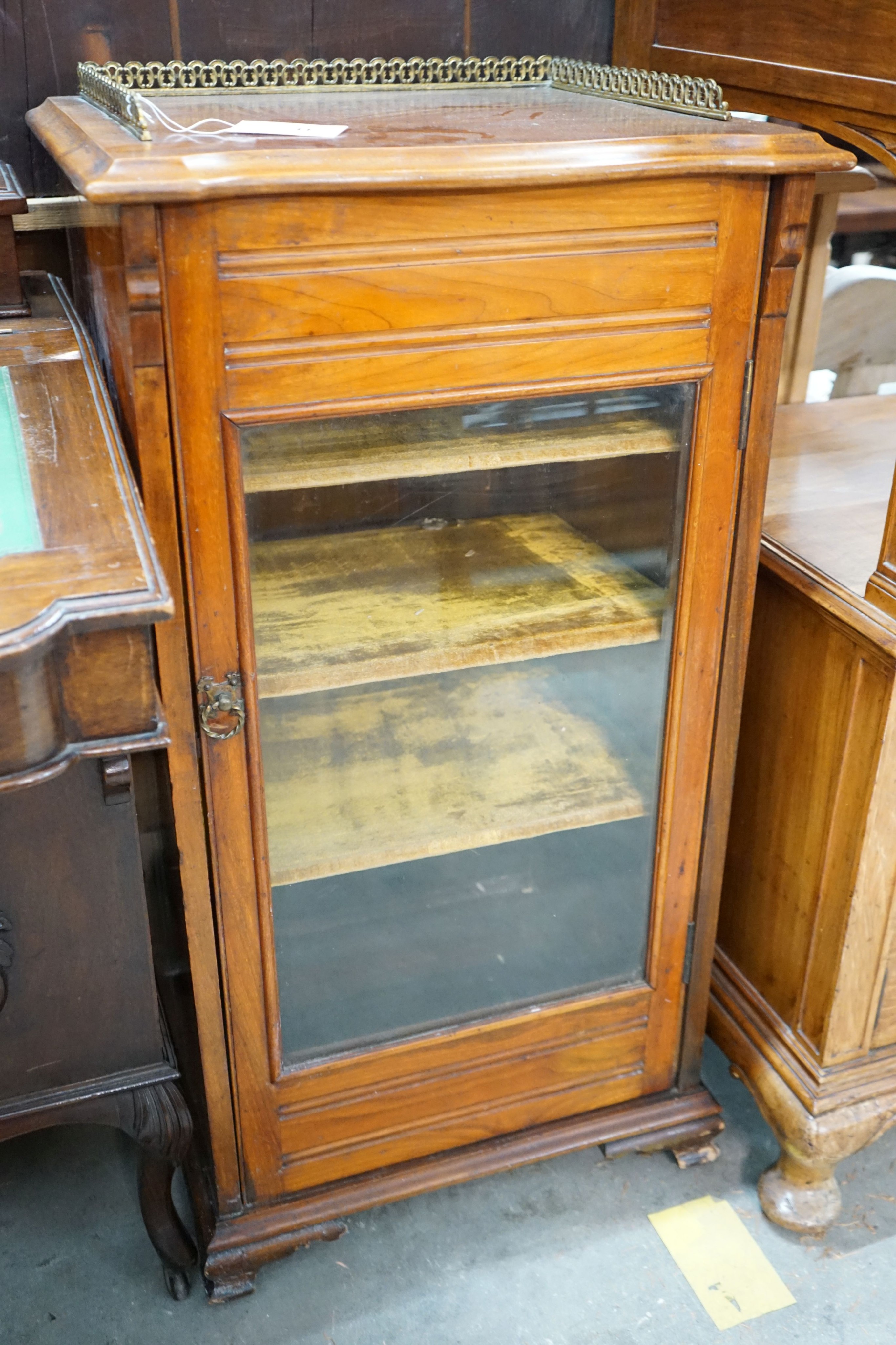 A late Victorian walnut serpentine front sheet music cabinet, width 49cm, depth 42cm, height 95cm